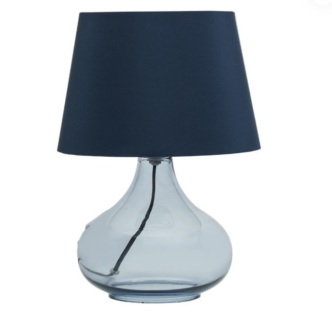 En plus de rendre le chaud plus chaud et plus doux, quelles autres fonctions la transparence élevée de la lampe de table en verre simple de style européen a-t-elle pour créer l'atmosphère de la pièce?